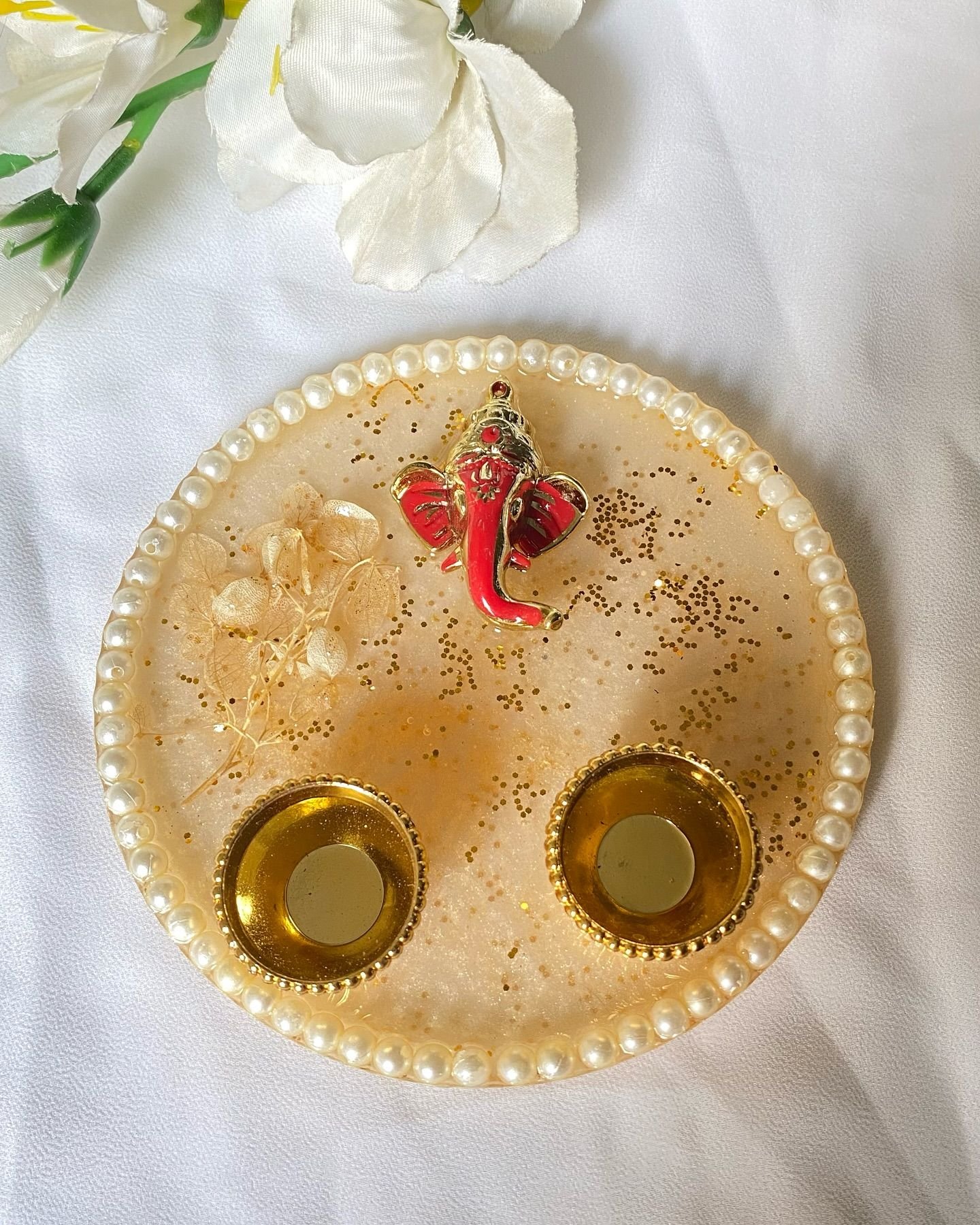 The blue thali with its peacock feather