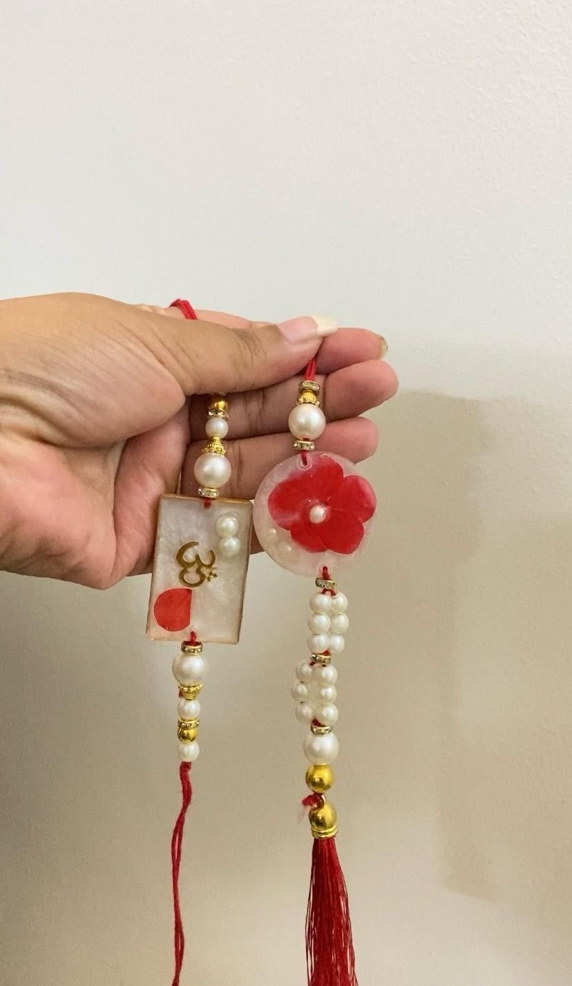 A red version with a red flower and a red tassel