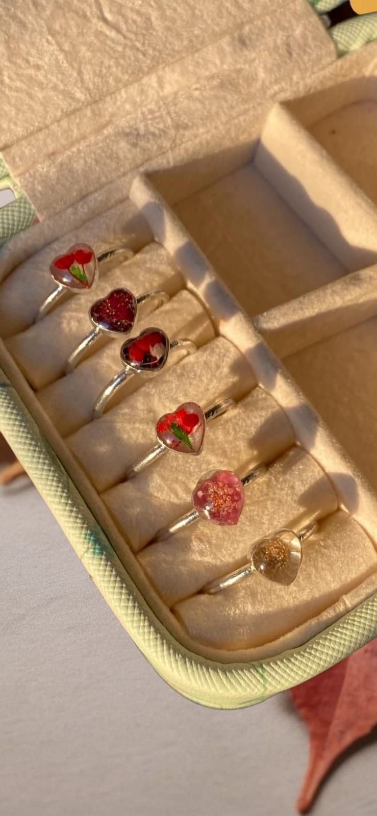 The same rings seen from above, showing the range of colours